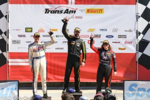 Menard, Drissi, and Ruman on the Trans Am T1 Class Podium at Charlotte Motor Speedway