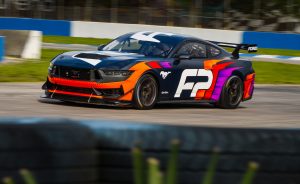 The new 2024 Ford Mustang GT4 Racecar on Forgeline One Piece Forged Monoblock GS1R Wheels